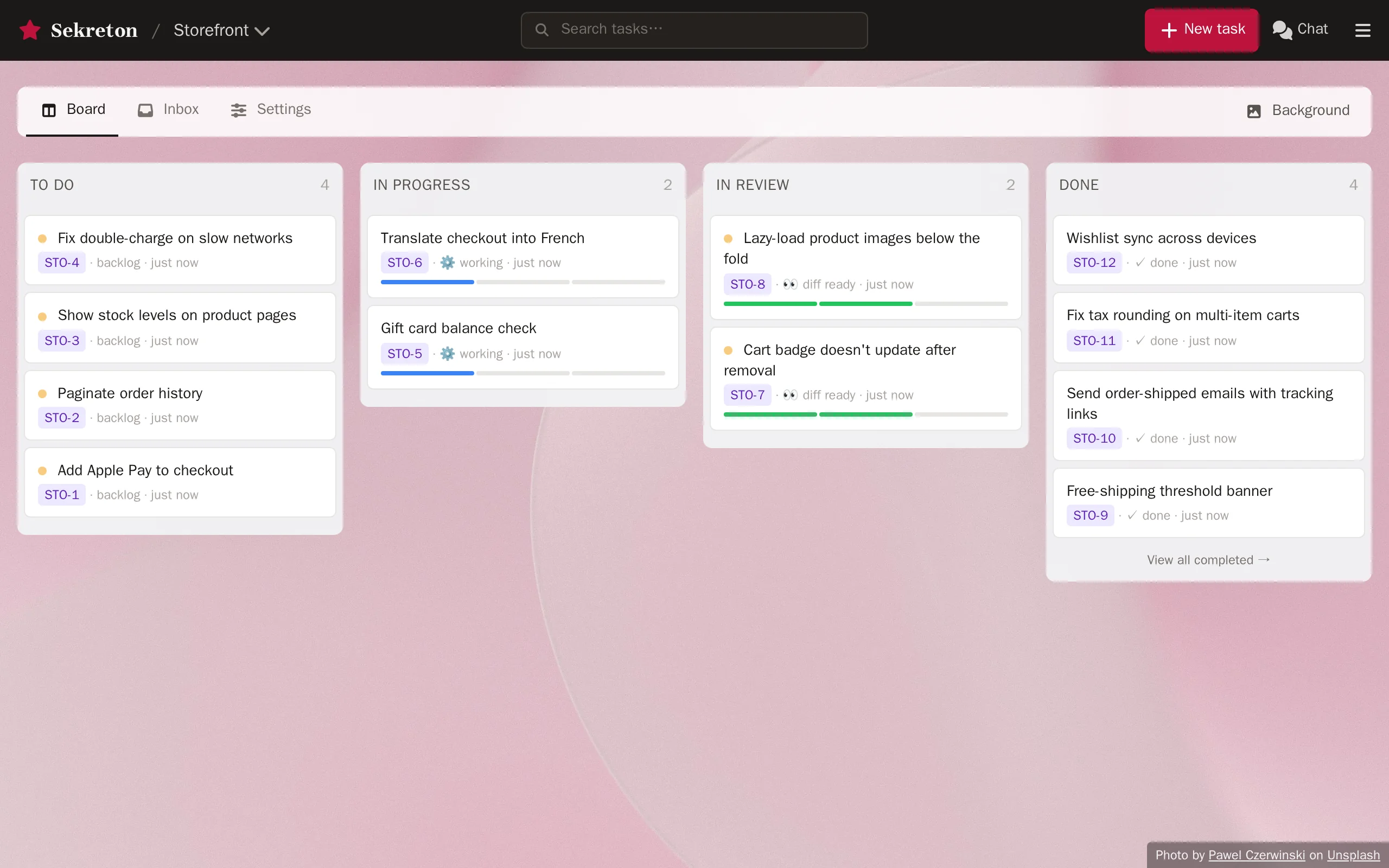 A team board in Sekreton, with tasks moving from To Do through In Progress and In Review to Done